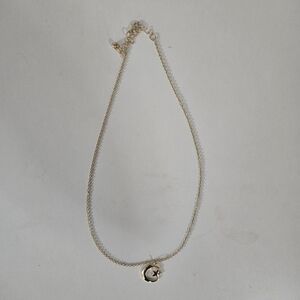 Elegant Gold Necklace with Star Pendant